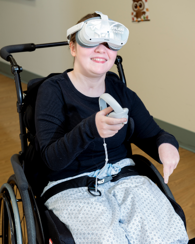 girl smiles with virtual reality headset over her eyes